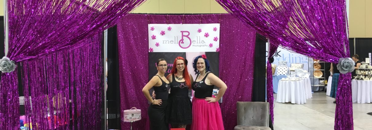 wedding show booth with Cecilee, Wanda, and Mell Bell