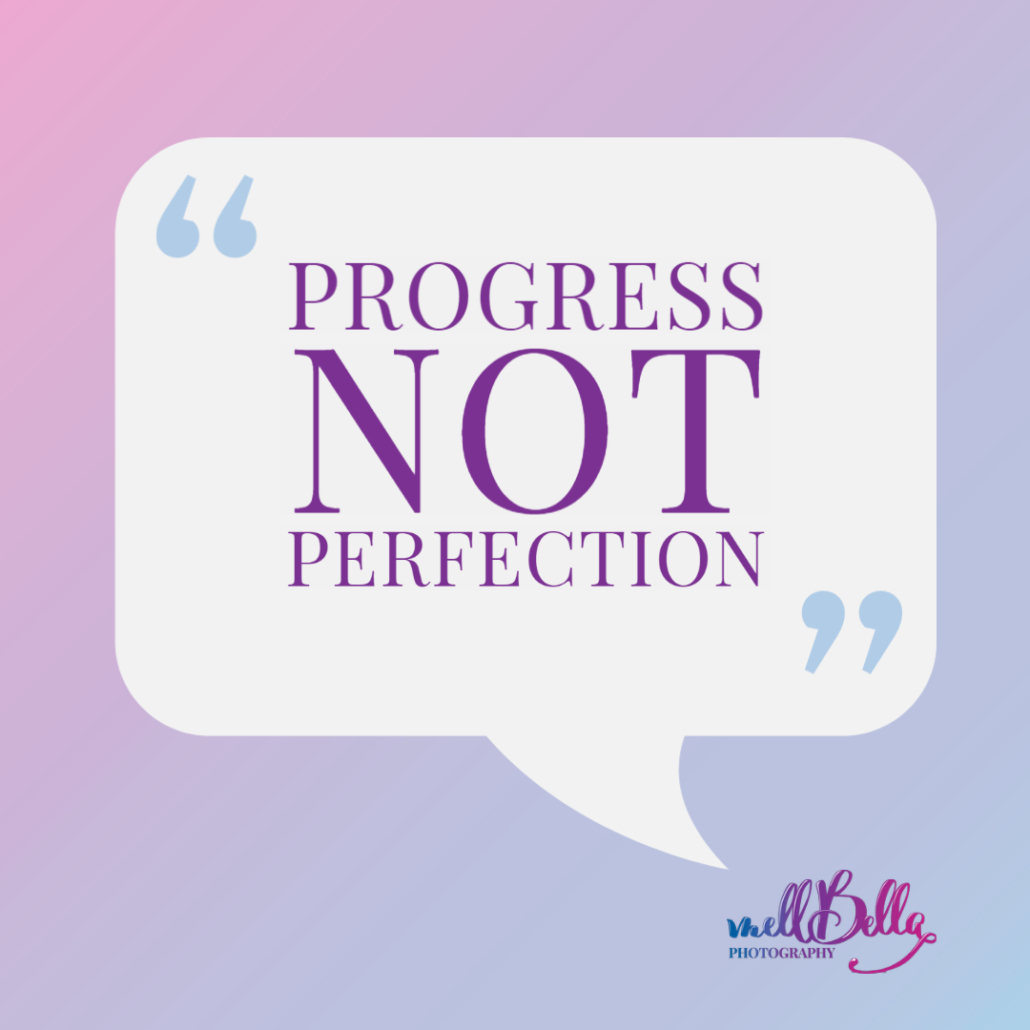 White quote bubble icon with large light blue quotation marks on which the text reads: "Progress Not Perfection" with the mellBella Logo under it