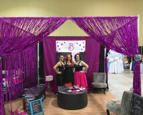 wedding show booth with Cecilee, Wanda, and Mell Bell