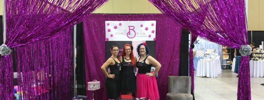 wedding show booth with Cecilee, Wanda, and Mell Bell